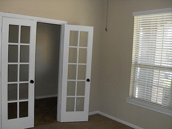 French doors accent this large study just off the entry