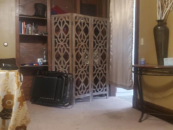 Large living room with 10ft ceilings and dark trim