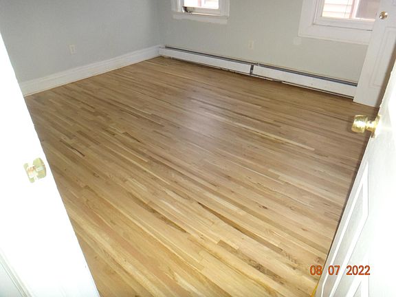 Spare bedroom 1 highlighting refinished floors