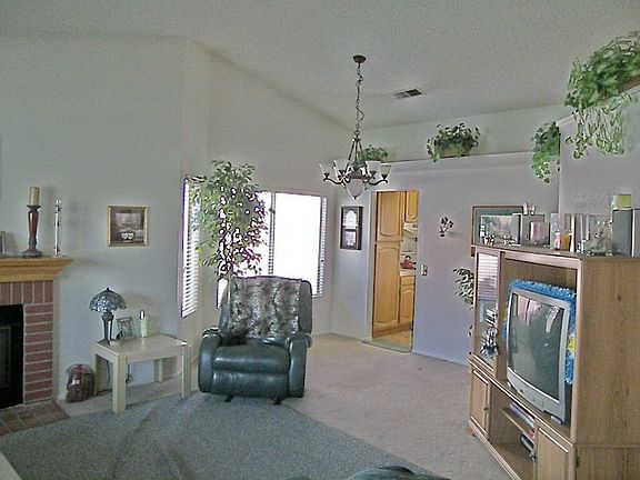 Living Room and Dining Room with Cathedral Ceilings