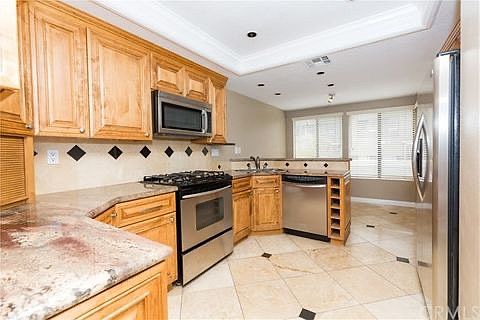 Nice kitchen with breakfast nook area all stainless steel appliances