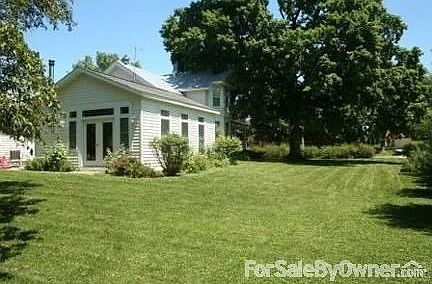 Wrap around porch provides shade and privacy!