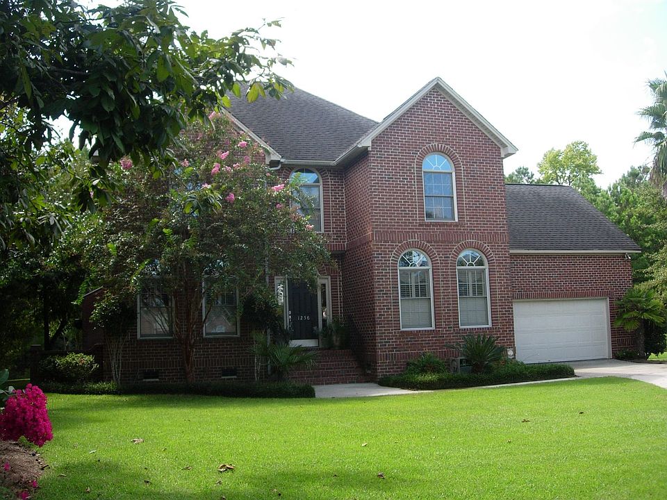 Brick 2 story on pond