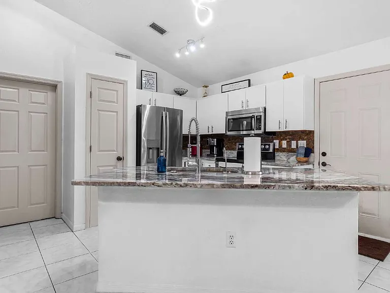 645 NW 65th St — Photo 14