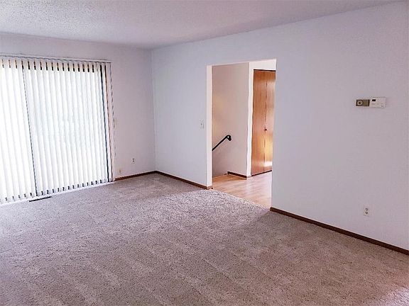 Large living room with wall-sized window
