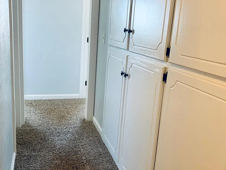 Upstairs hall storage + access to 2nd & 3rd bedrooms