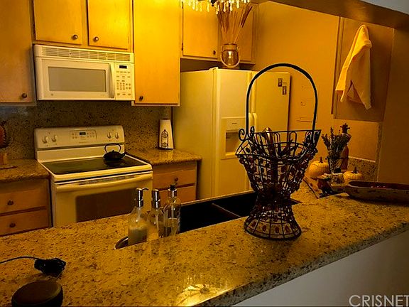 5th image of 5460 White Oak Ave Unit F205