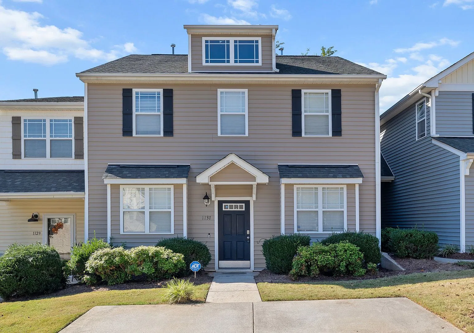 **Beautiful 4 Bed Townhome with First Floor Primary Suite** — Photo 1