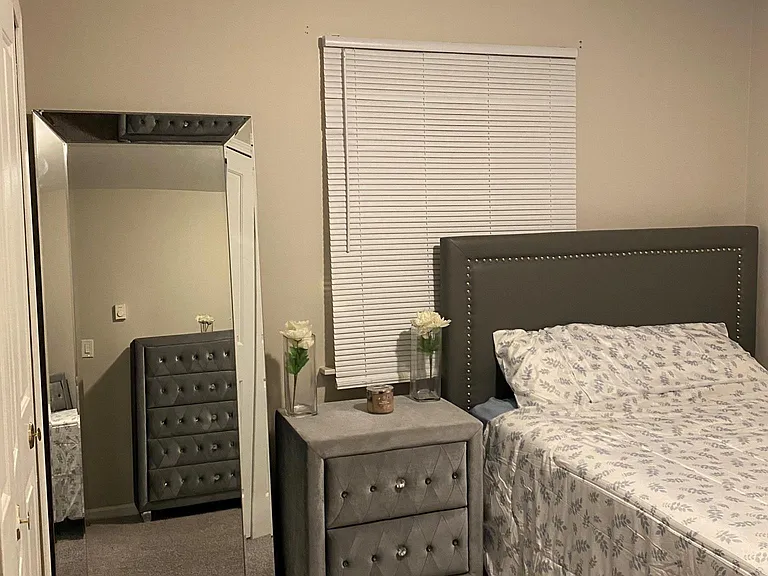 Spacious 2nd bedroom has QUEEN frame bed