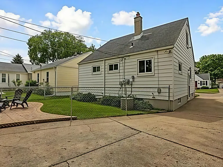Semi-Fenced Backyard (area behind house is fully fenced, driveway is not)