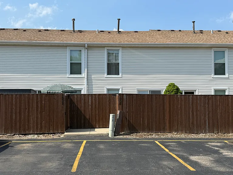 Private Back Gate to Parking Lot
