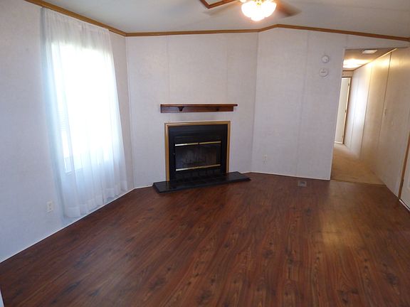 Living Room with Mahogany Laminate floors