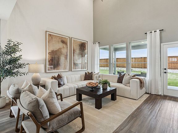 Large windows in gathering room offer natural light