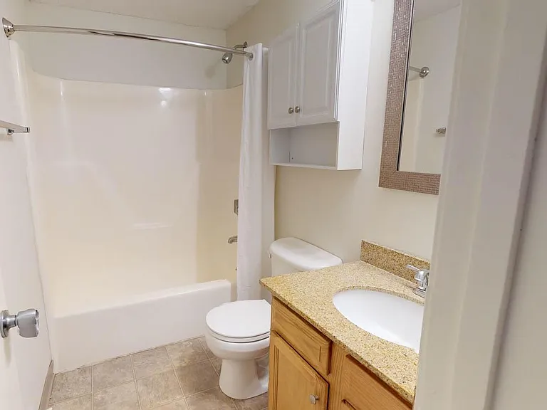 Bright and spacious with custom shower and tub!