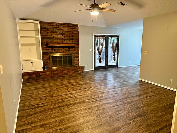 Living area with wood-burning fire place