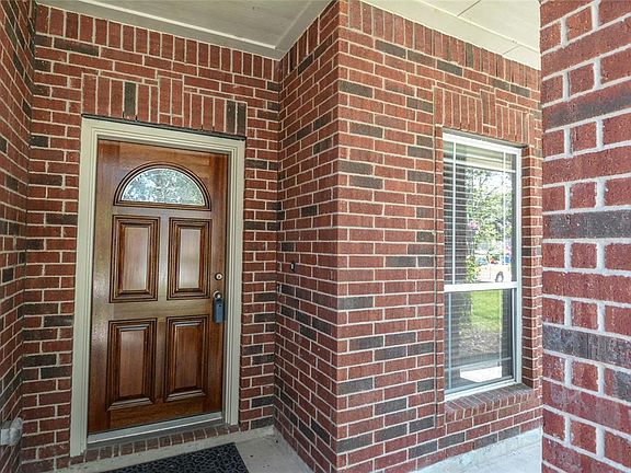 Refinished front door welcomes you in!