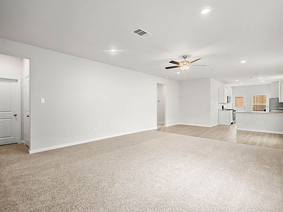 The family room is spacious and ready for your family hangouts.