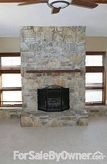 Living Room : Vaulted Ceiling and Custom Limestone Fireplace