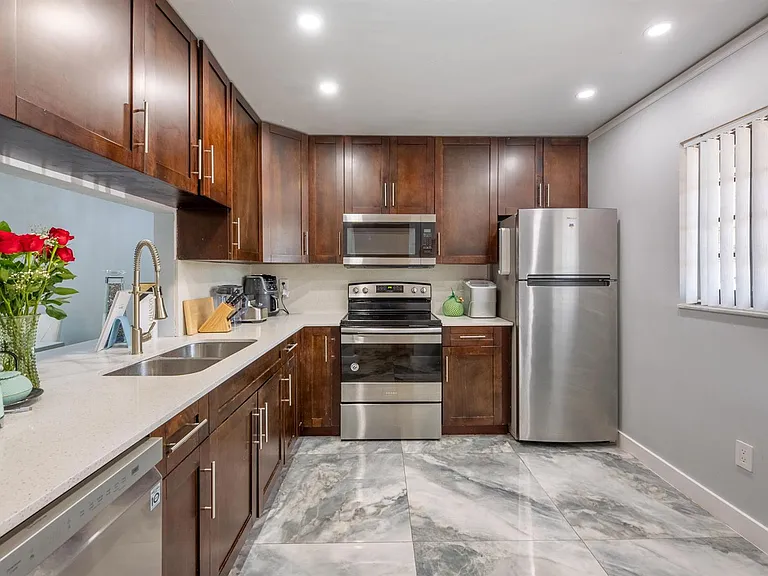 1129 NE 210th Ter #210 — Photo 8