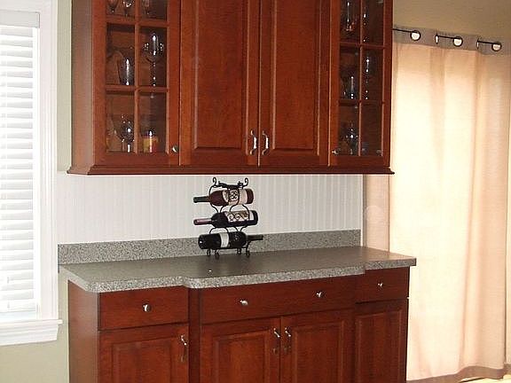 There are planty of cabinets to store your cooking needs or display your treas