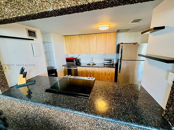5th image of 900 Bay Dr APT 411