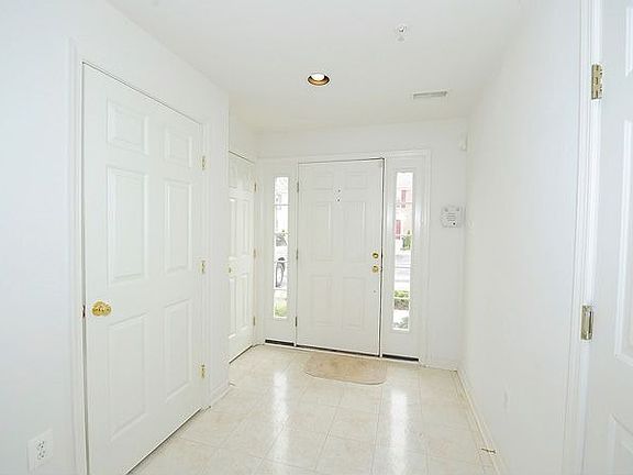 Foyer w/ Half Bath & Garage Access