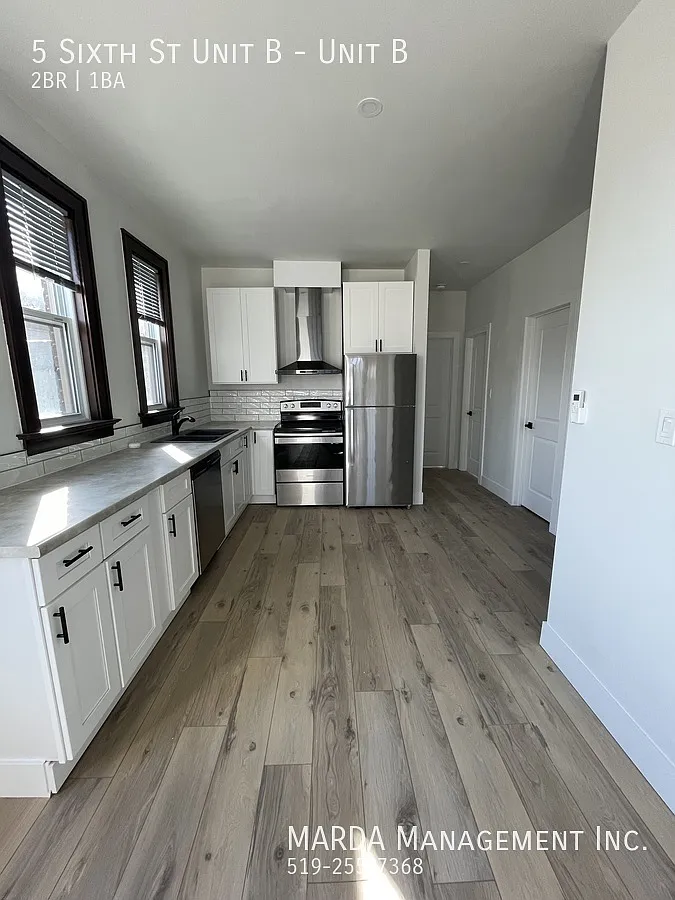 Modern 2 Bed/1 Bath Unit In Chatham + Hydro — Photo 1