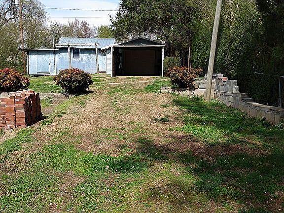 Garage with 220plugins and outbuildings