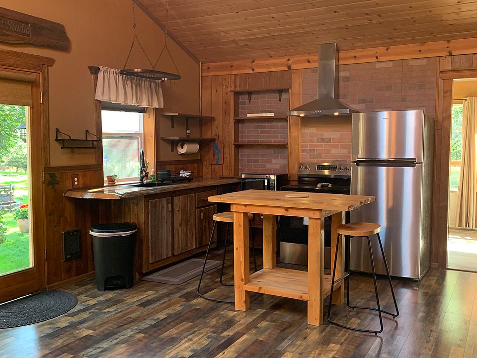 Another view of the kitchen which shows the door with window.