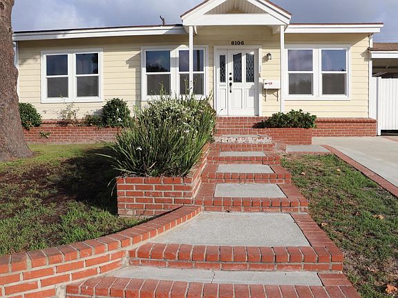 Street view of property. Front Unit door.