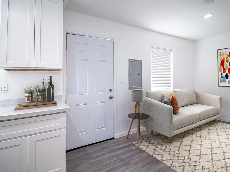 This image shows a virtually furnished space. This space comes unfurnished but can be beautifully furnished by our in-house design team for an additional fee.