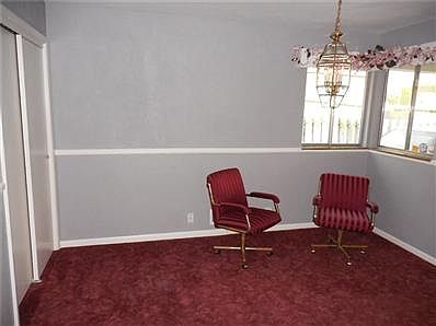 Although not a separate room, this dining area is connected to both the living room and kitchen.  The cook is never left out of the conversation while entertaining.