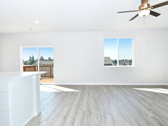 The living area is filled with natural lighting.