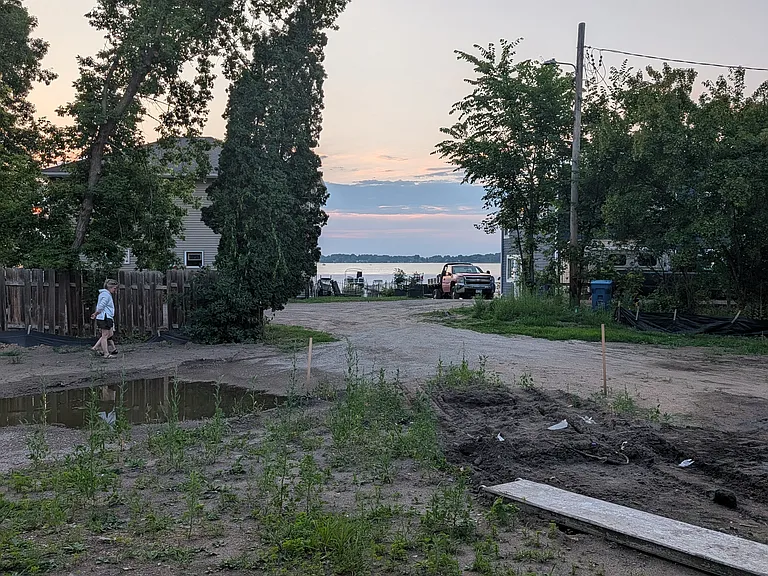 View of Forest Lake from the front covered porch. Yard will be sodded and the driveway will be paved prior to move-in day.