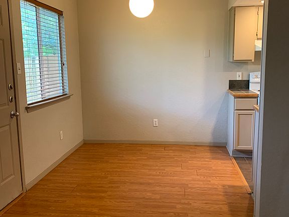 Dining area with pendant light fixture (again note new door was installed)