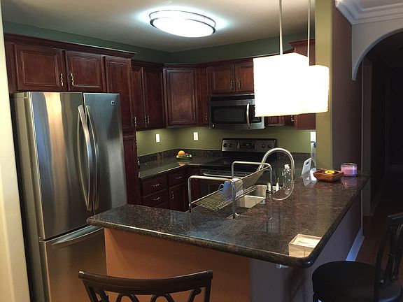 Kitchen with cherry cabinetry