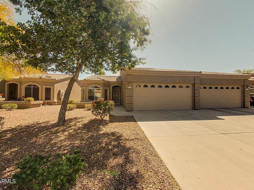 Front entry of home showing 2 car garage.