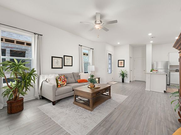 Host family and friends in this open-concept family room