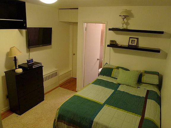 Bedroom with bathroom tub