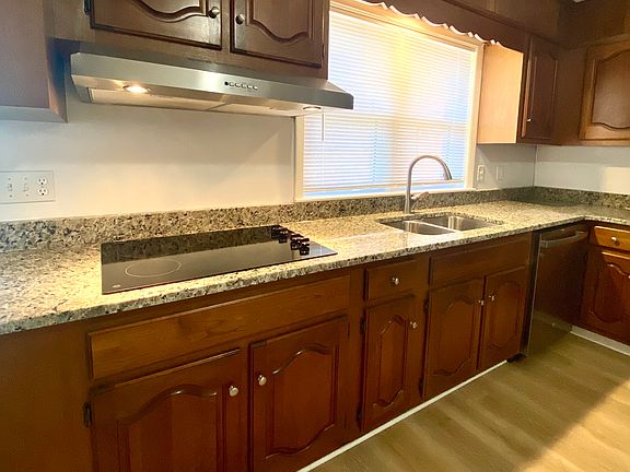 Kitchen - new granite counters. Solid cherry cabinets.