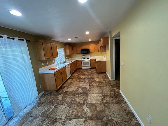 Kitchen and Eating Area , Brand New Stove, Refrigerator, Microwave , Dishwasher