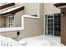 Stone Patio with door to Living Room. - 4047 Wilshire Cir