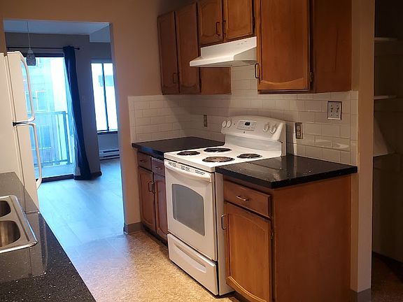 It's JUST been remodeled with new quartz countertops and subway tile backsplash.