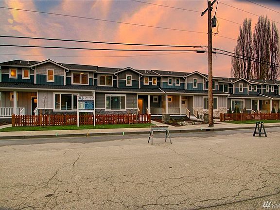 Front from 7th Street.  Beautiful patio for each unit. 