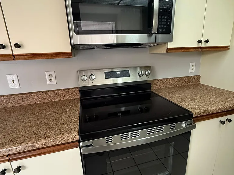 Brand new Microwave Oven and Stove with Glass Top Burners