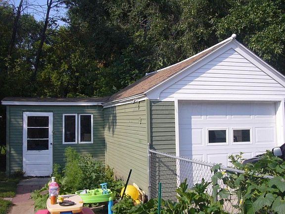 garage with attached shed