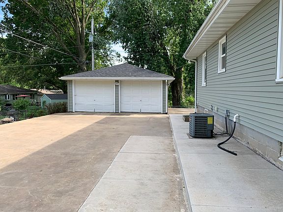 One stall garage for each unit. Lone driveway. Central Air