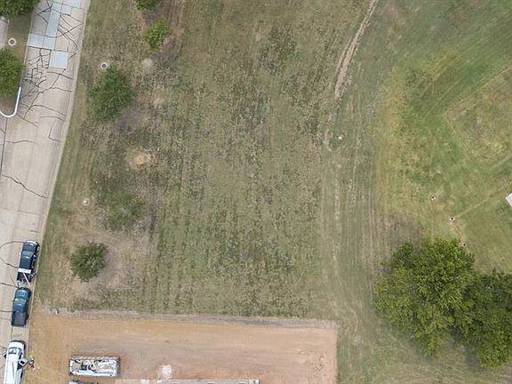 The home site is just to the left of the new home being built. The lots are similar in size so you can see what a wonderful size it is and how much how will fit.