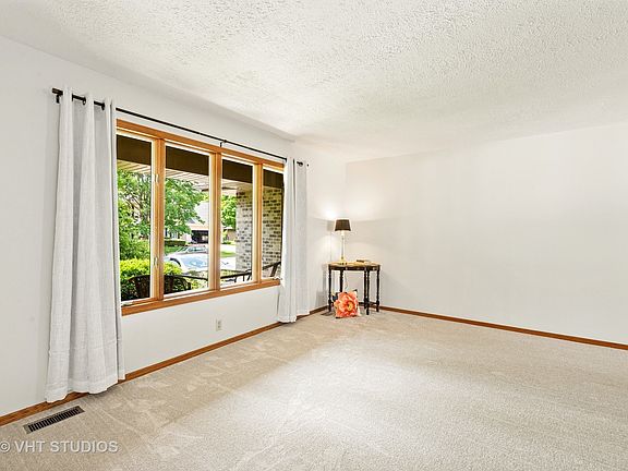 The Formal living room and dining room welcome your guests with warmth and charm. Lots of light from