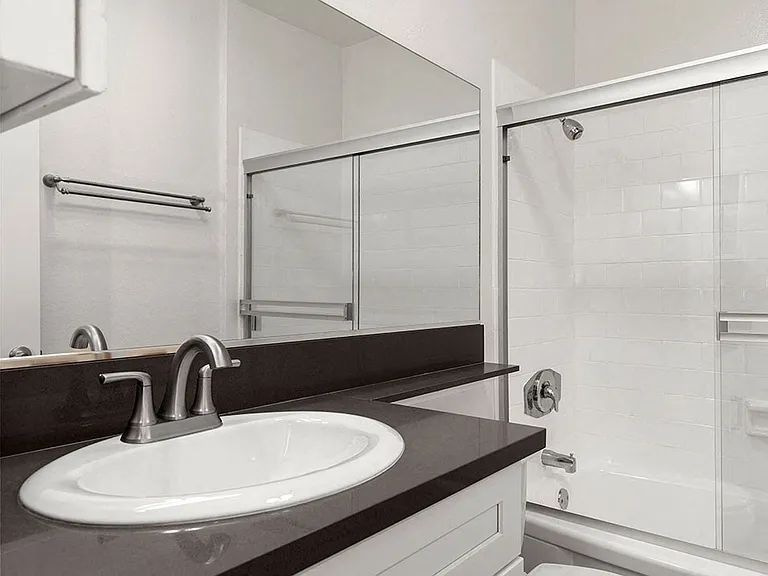 Modern styled bathroom with shower and tub.